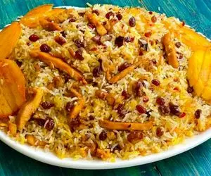 آموزش آشپزی؛ کمی برنج و مرغ و سیب زمینی میشه این پلو خوشمزه که همه دستورشو ازت میخوان