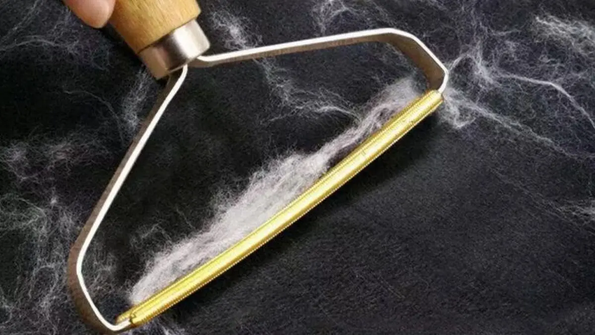 از بین بردن پرز لباس