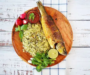 آشپزی حرفه ای؛ طرز تهیه سبزی پلو با ماهی با ترفند های خوشمزه تر شدنش + ادویه جادویی