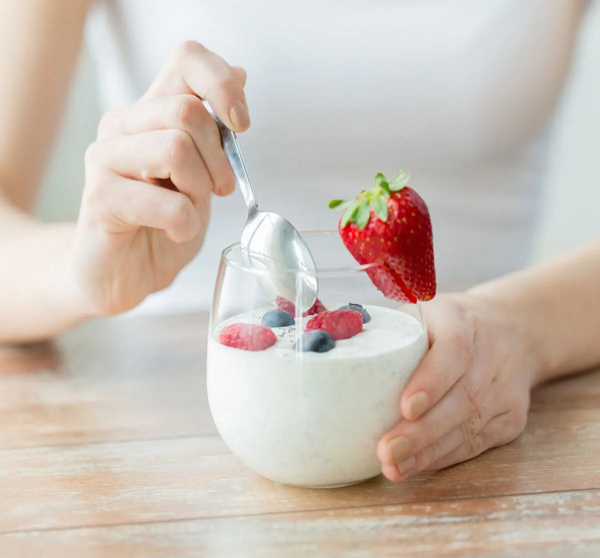 photo-woman-yogurt-fruit-probiotics-e1489189136880