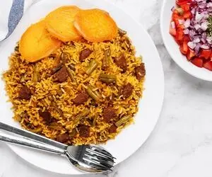 آشپزی حرفه ای؛ ترفند های خوشمزه تر شدن لوبیا پلو 
