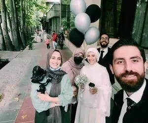 (عکس) ماجرای عروس و داماد خیابان ولیعصر چیست؟