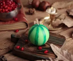 ترفند های خانه داری؛ شمع هندوانه ای ایده ای شیک برای دیزاین یلدا