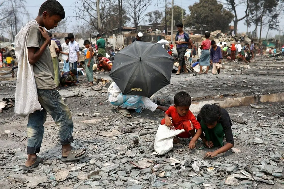2021-03-24T083406Z_611655449_RC2KHM9L6KW2_RTRMADP_3_BANGLADESH-ROHINGYA-FIRE-scaled