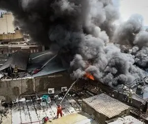 (ویدئو) جزئیات یک آتش سوزی بزرگ در بازار آهن شادآباد تهران