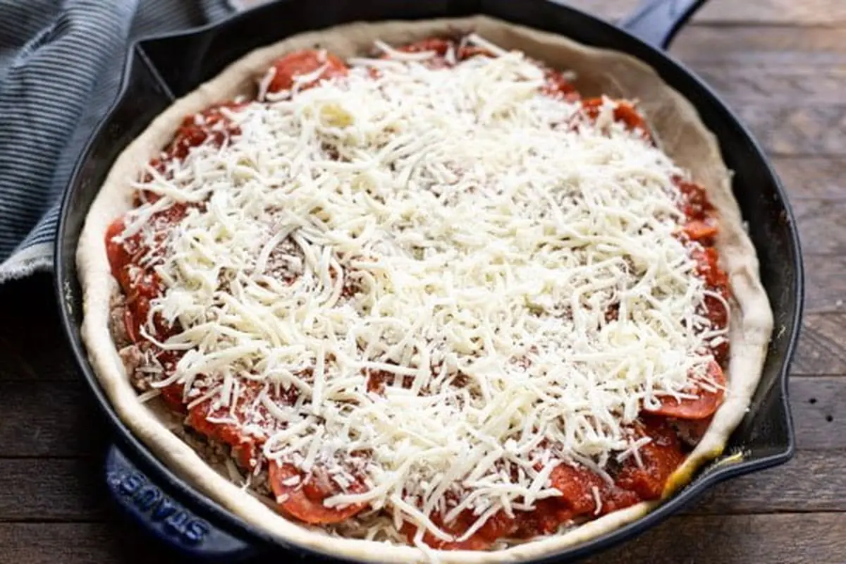 pizza-ingredients-on-pizza-dough