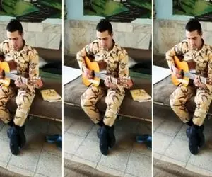 آواز خیابانی؛ ببینید این سرباز چه دلنواز و پر احساس با گیتار آهنگ اجرا میکنه!