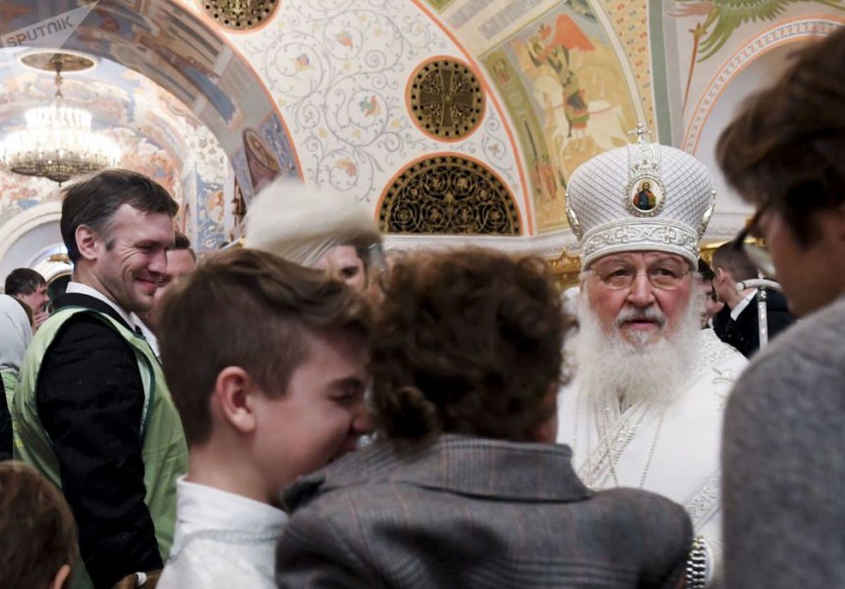 (تصاویر) مراسم غسل تعمید در یخبندان روسیه