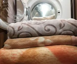 خونه تکونی عید؛ نحوه شستن پتو با ماشین لباسشویی و انتخاب برنامه مناسب