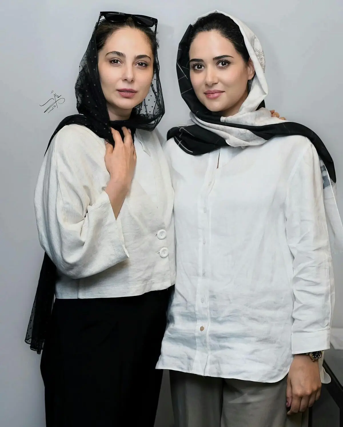 Photo by #حاشیه و #حواشی on October 01_ 2024. May be an image of 2 people_ people smiling_ scarf and headscarf.