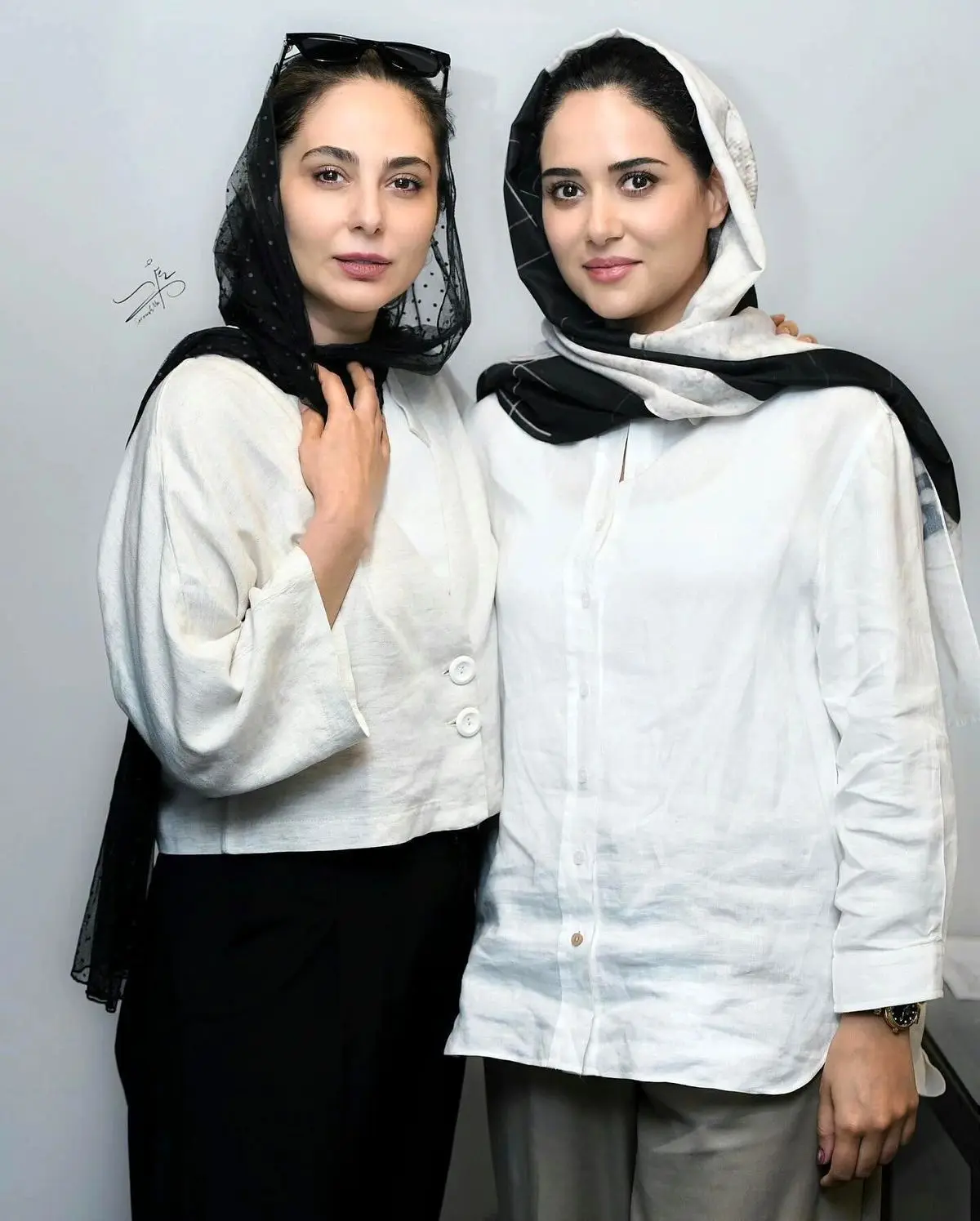 Photo by #حاشیه و #حواشی on October 01_ 2024. May be an image of 2 people_ people smiling_ scarf and headscarf.