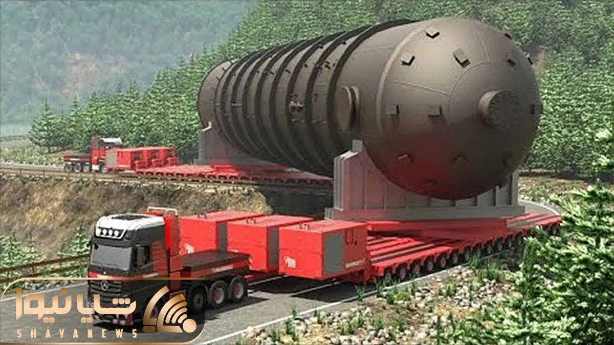 جا به جایی های غول پیکر؛ دوتا اسب تریلی جلو و عقب یه برج قد میلاد رو سر پیج می پیچونن