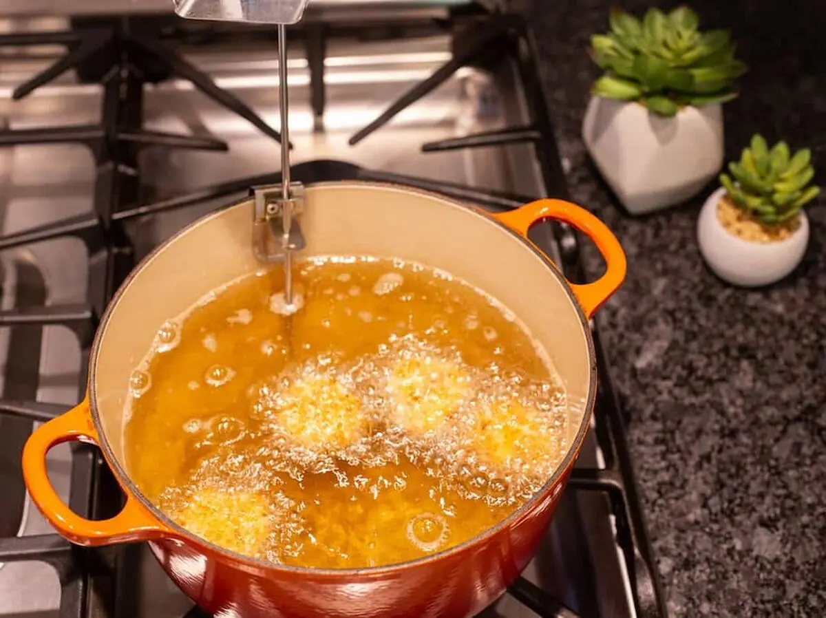 deep-frying-pickles-bubbling-in-oil-Photograph-©-Good-Food-Stories-LLC