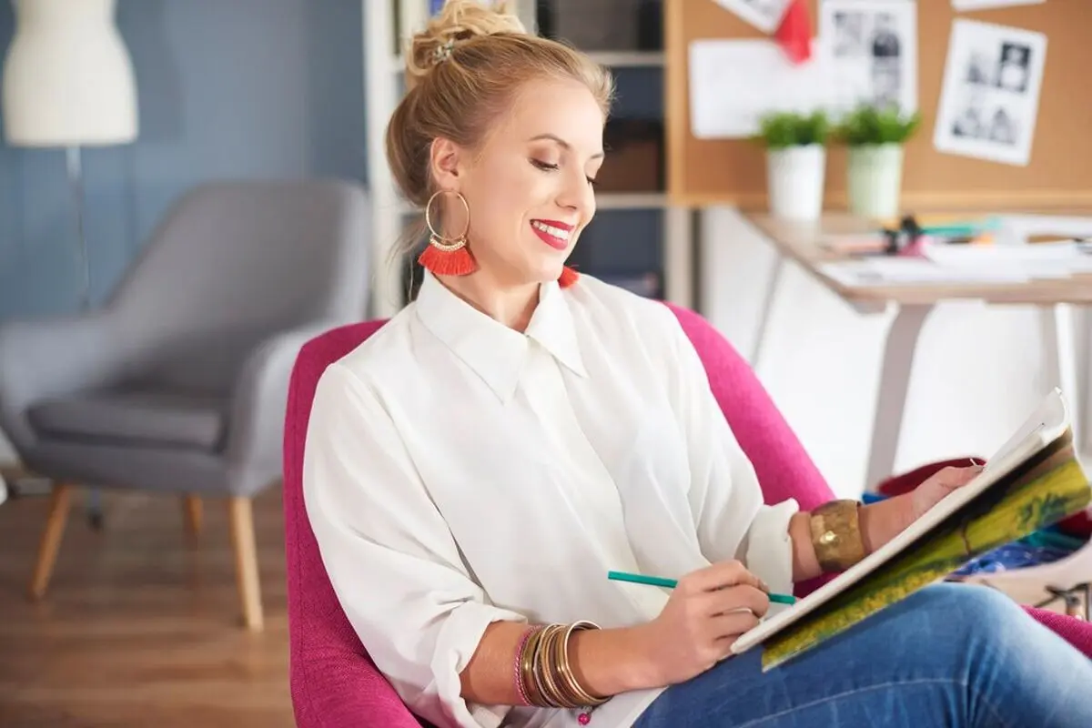close-up-woman-creating-home-office_329181-18126