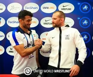 عکس یادگاری حسن یزدانی و دیوید تیلور قبل از نبرد بزرگ