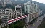 ساختن چین؛ تو شهر چند طبقه چین رو سقف خونه میدون شهره قطار از وسط خونه هاش رد میشه ساختن چین؛ تو شهر چند طبقه چین رو سقف خونه میدون شهره قطار از وسط خونه هاش رد میشه