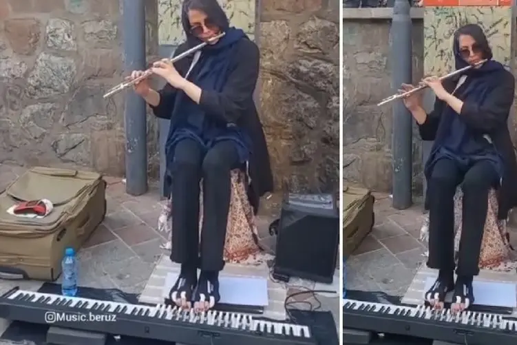 مطربی خیابانی؛ خانوم نوازنده که جلو مترو تجریش با تمام وجودش ساز نواخت