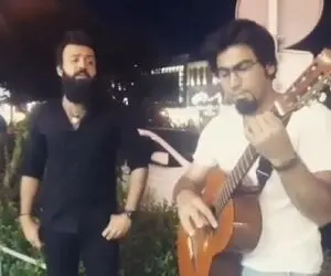 آواز خیابانی؛ ببینید آقای ریش بلند چه دلنواز آهنگ رضا صادقی عشقت نمیره از سرمو میخونه
