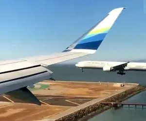 ( ویدیو) لحظه ای باورنکردنی؛ فرود دو هواپیما همزمان در فرودگاه مشهور آمریکا