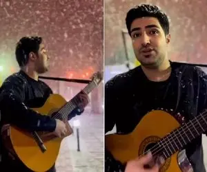 آواز خیابانی؛ آقاهه با آهنگ زمستون خدا سرد دمش گرم ملت روبه وجد آورد فقط برف سرتا پاش