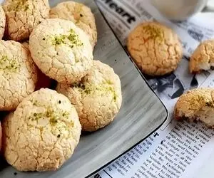 آشپزی حرفه ای؛ ترفند های خوشمزه تر شدن شیرینی نارگیلی اینجوری بپزی همه دستورشو میخوان