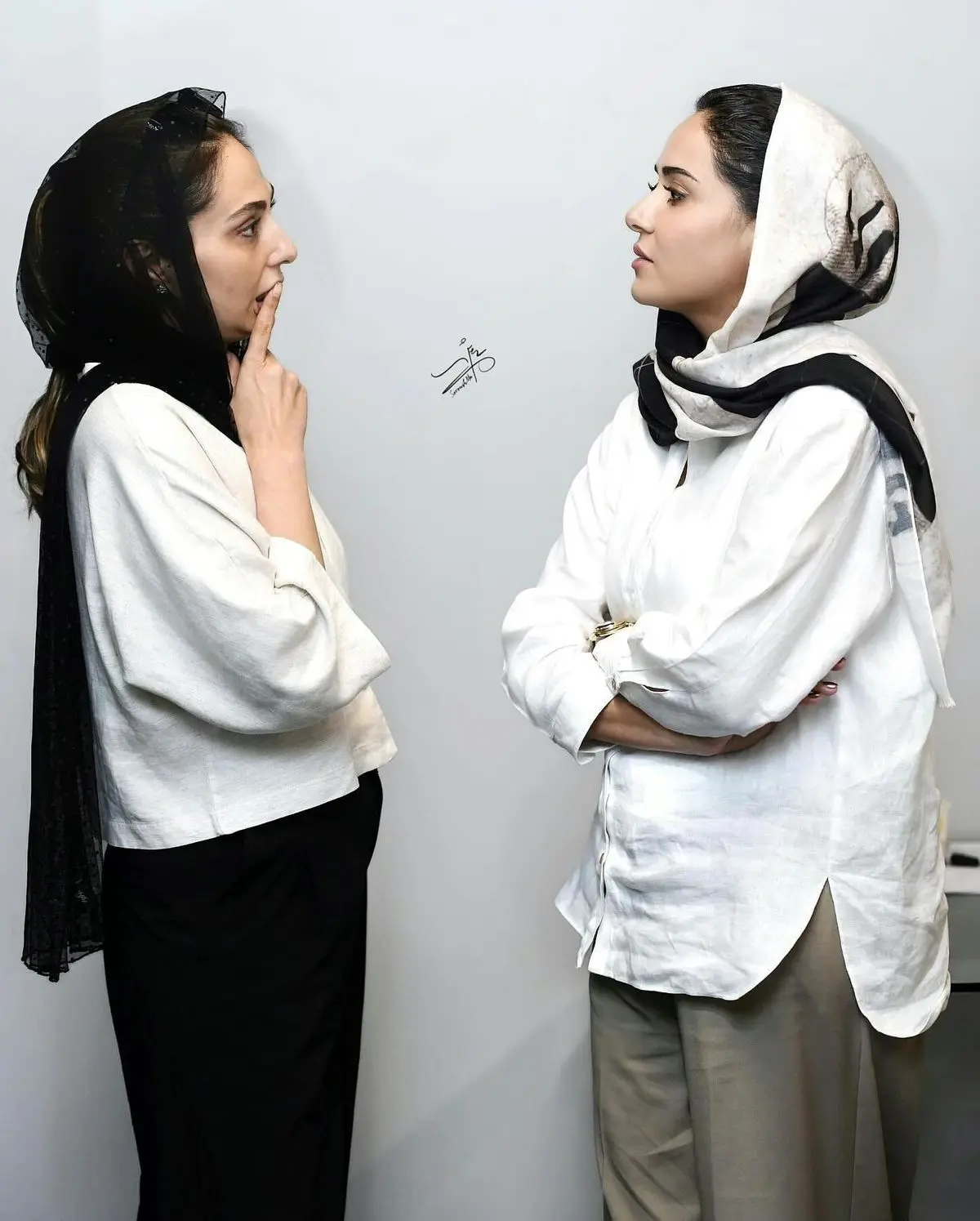 Photo by #حاشیه و #حواشی on October 01_ 2024. May be an image of 2 people_ headscarf_ scarf and head covering.