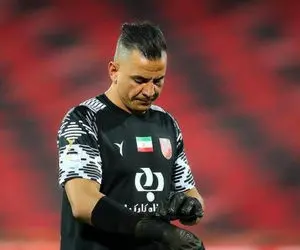 (عکس) واکنش جالب حامد لک به شعار تماشاگران استقلال