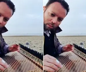 آواز خیابانی؛ ببینید آقاهه چه دلنشین لب ساحل آهنگ دریا دریا دریا رو با سنتور میزنه!