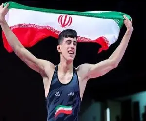 تقدیر مسئولان قم از نابغه کشتی با اهدای قابلمه!