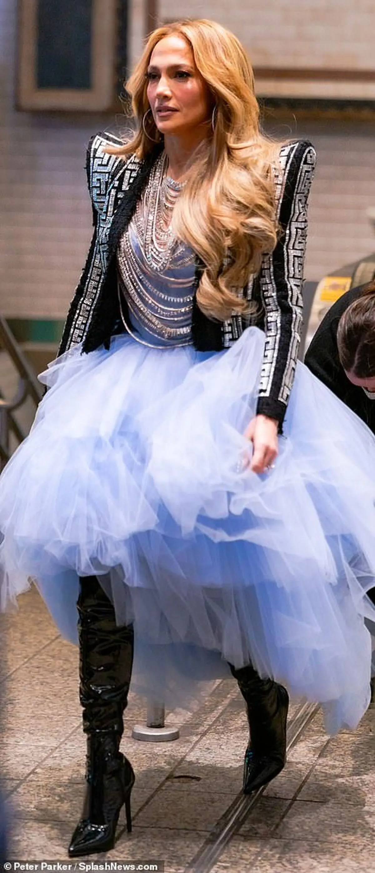 37418540-9099661-Designer_J_Lo_popped_her_dramatic_couture_jacket_back_on_as_the_-a-82_1609351754772
