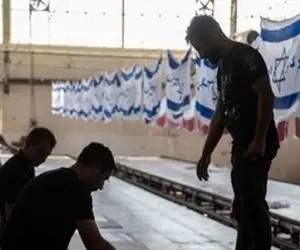 باورتان می شود در ایران کارخانه تولید پرچم آمریکا داریم؟!