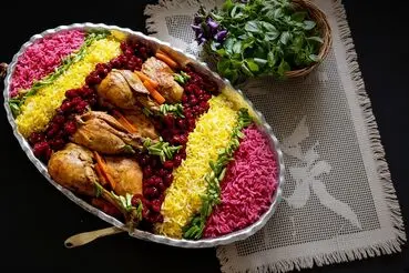 طرز تهیه آلبالو پلو با مرغ زعفرانی؛ ترفند های خوشمزه تر شدنش