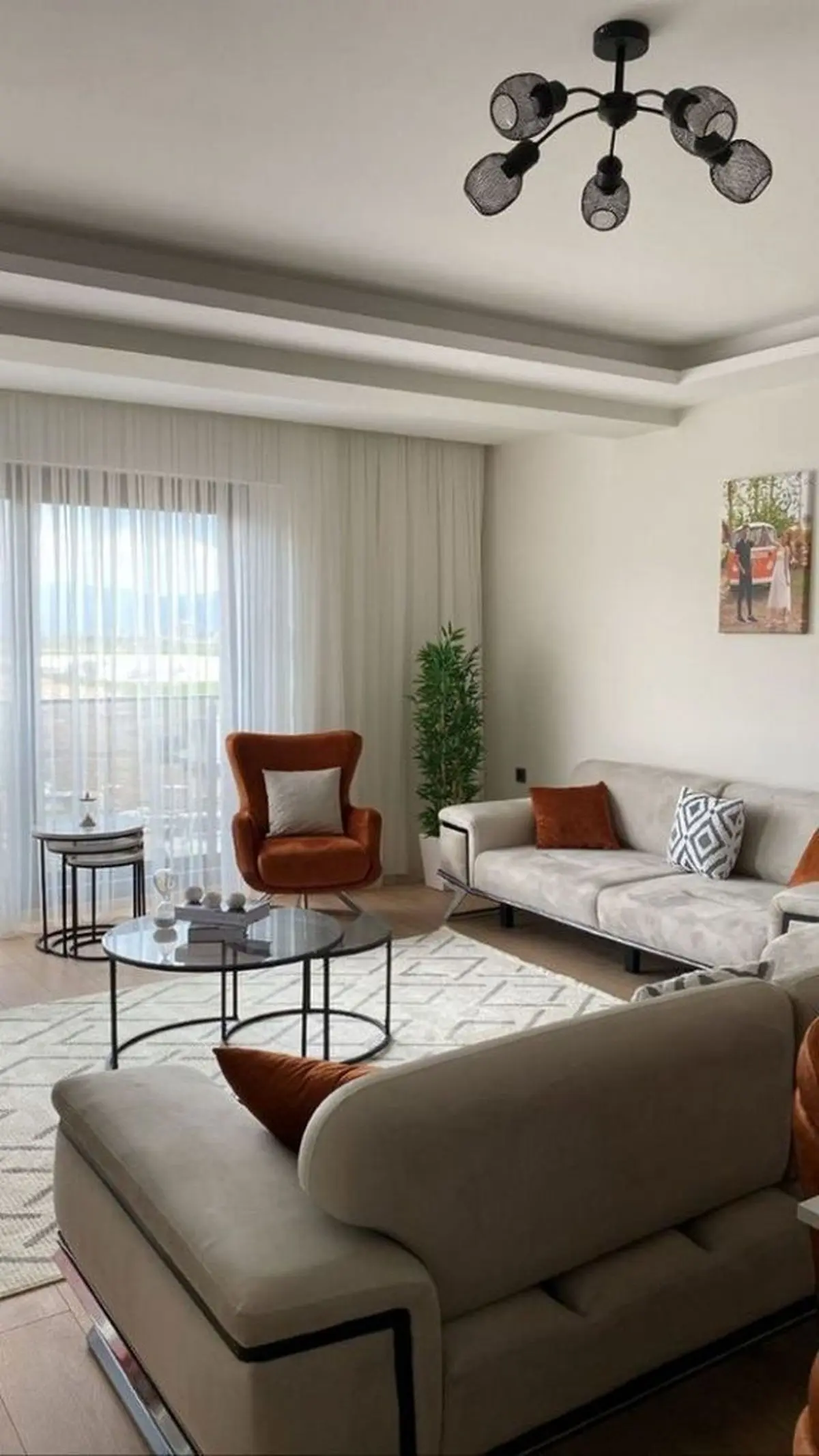seven-seater-sofa-arrangement-in-a-rectangular-living-room-24-576x1024