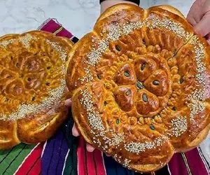 آموزش آشپزی؛ زیباترین نون جهان که روش نقش و نگار مثل قالی میکشن بعد میپزن چه استعدادی