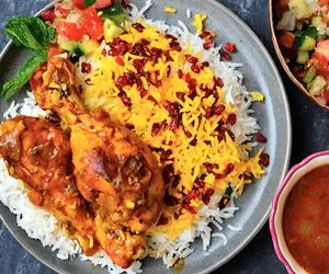 آشپزی حرفه ای؛ طرز تهیه زرشک پلو با مرغ / ترفند های گرفتن بوی زهم مرغ